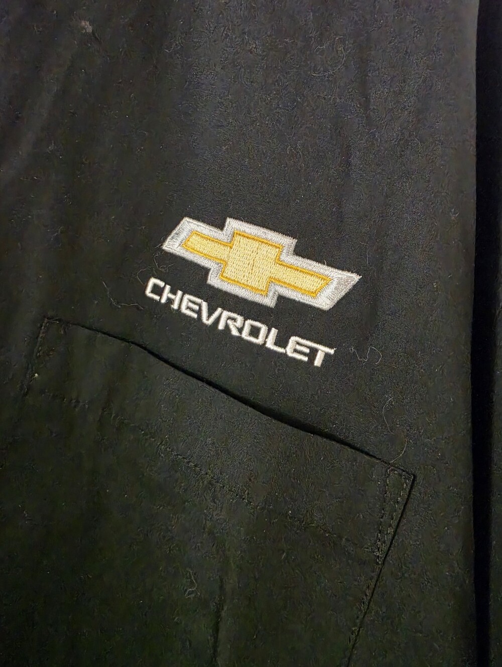 Port Authority Black Shirt with Blue Brand Tag and Embroidered Accent